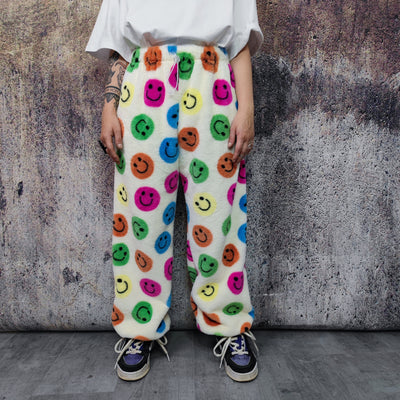 Festival fleece joggers luminous emoji pants handmade fluorescent faux fur raver trousers premium party overalls in rainbow smiley pattern