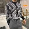 black and white striped long-sleeved high fashion shirt in black