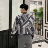 black and white striped long-sleeved high fashion shirt in black