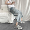 loose fit cargo pockets roll up wide leg jeans in bleached gray blue