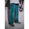 Distressed graffiti spray painted jeans in green
